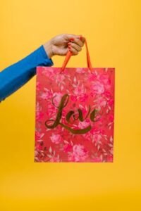A vibrant floral gift bag with 